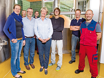 © Feneberg/ Bio mit Gesicht Betriebsleiterin mit Team